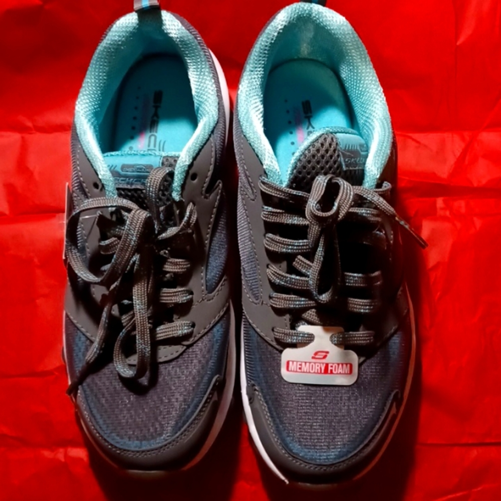 Womens Sketchers, with memory foam, never wore, too small.